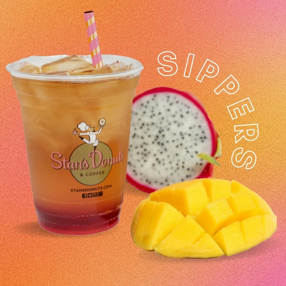 a glass of orange juice next to a cup of coffee