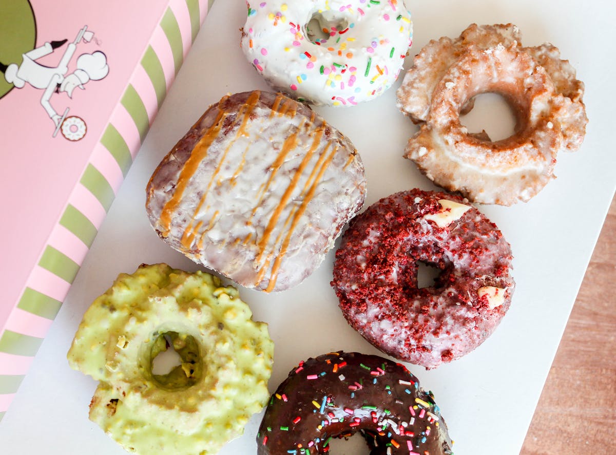 a box filled with different kinds of donuts