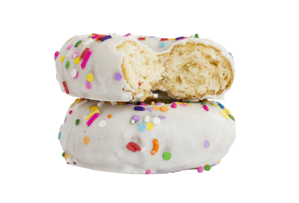 a white birthday cake donut