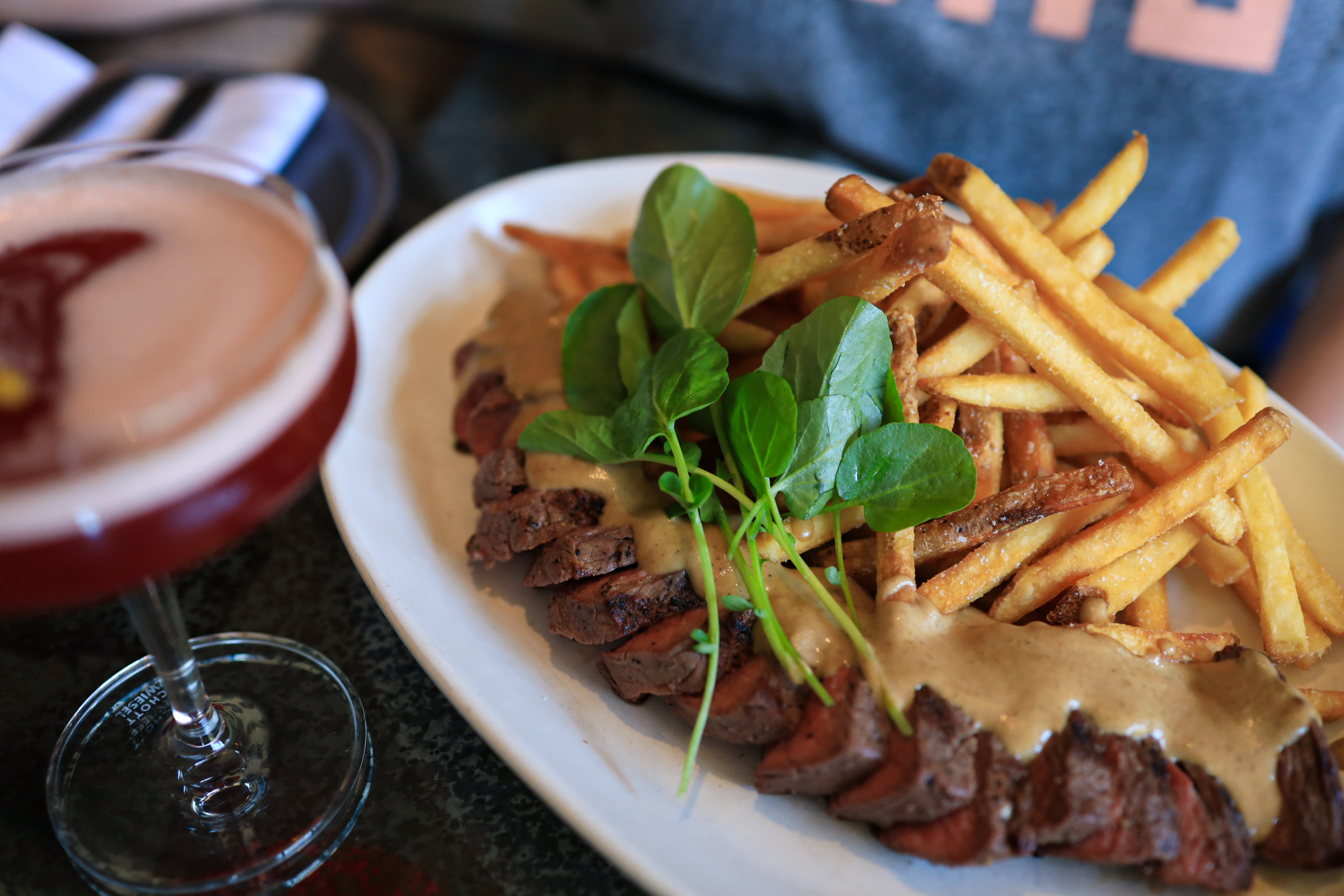 a plate of food and a drink