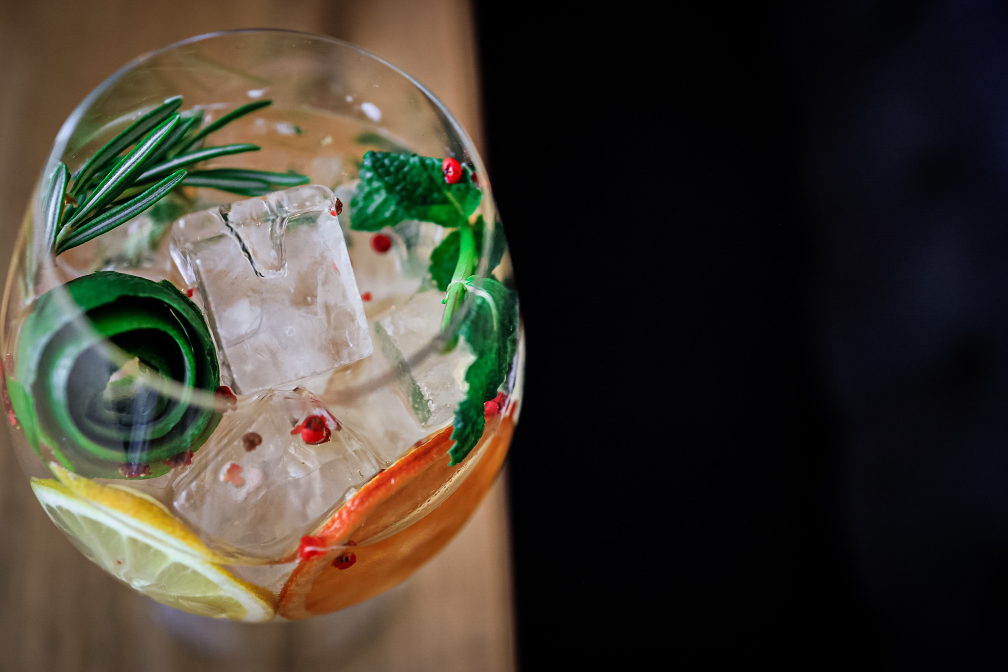 a glass with a drink and ice cubes