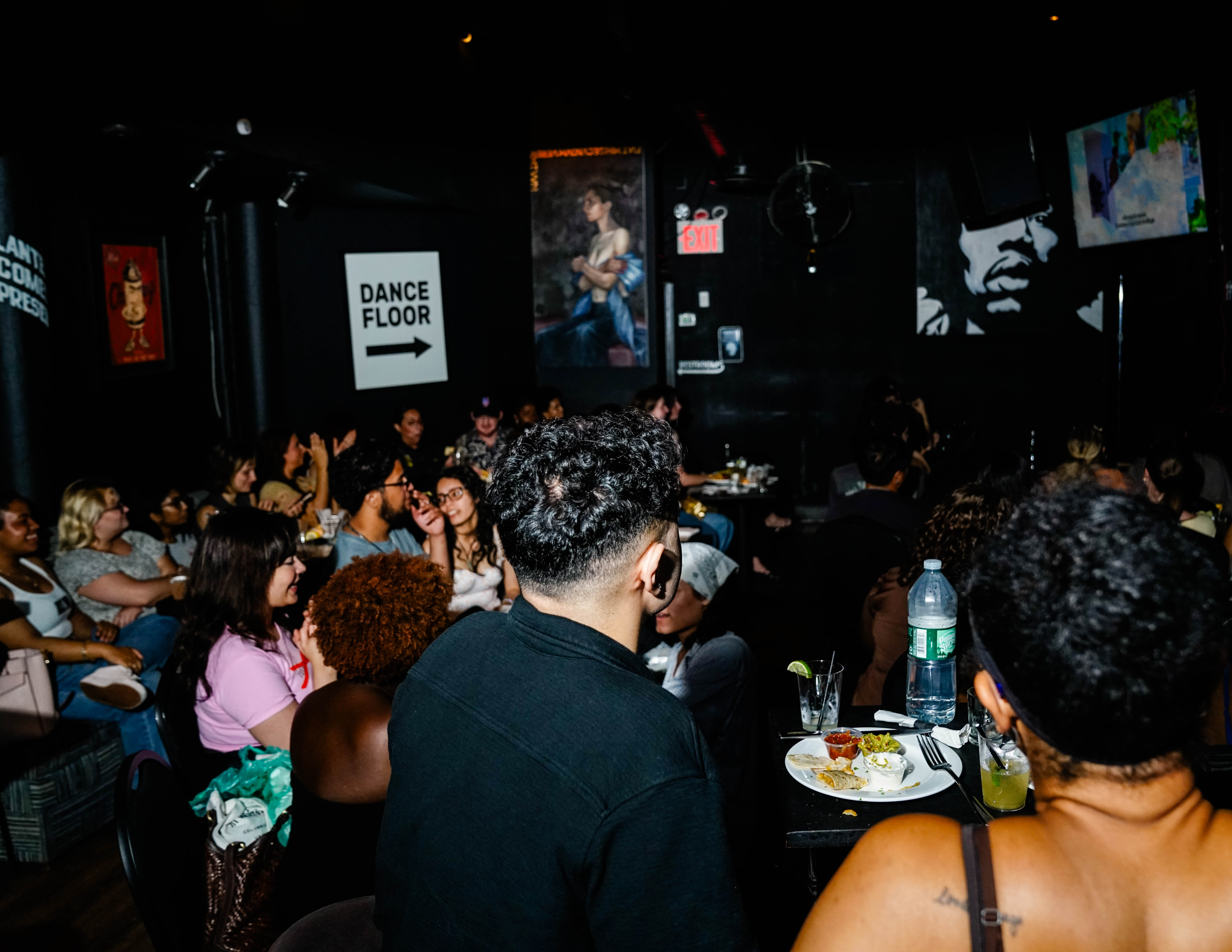 a group of people sitting in a room