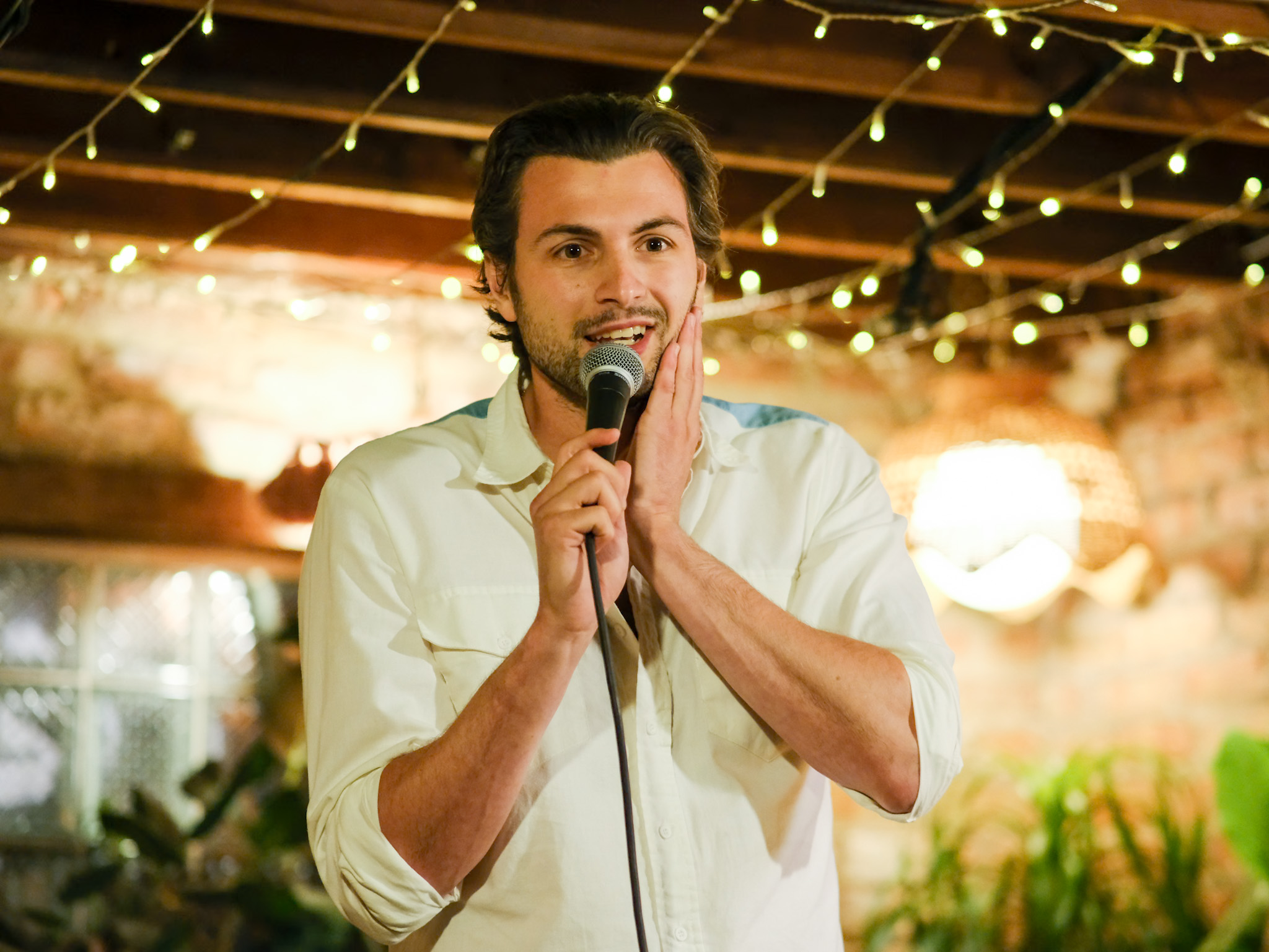 a man holding a microphone