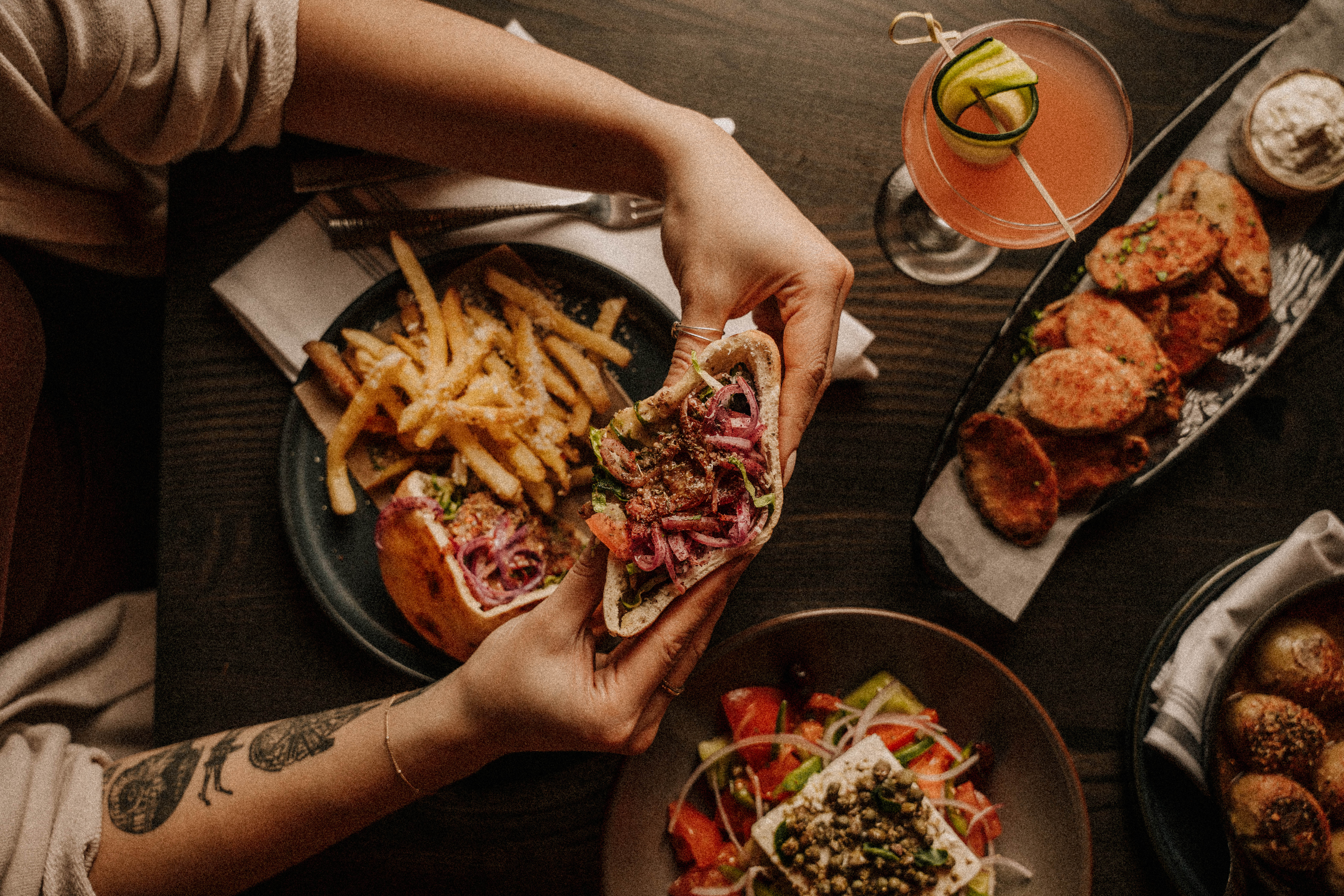 a person holding a plate of food