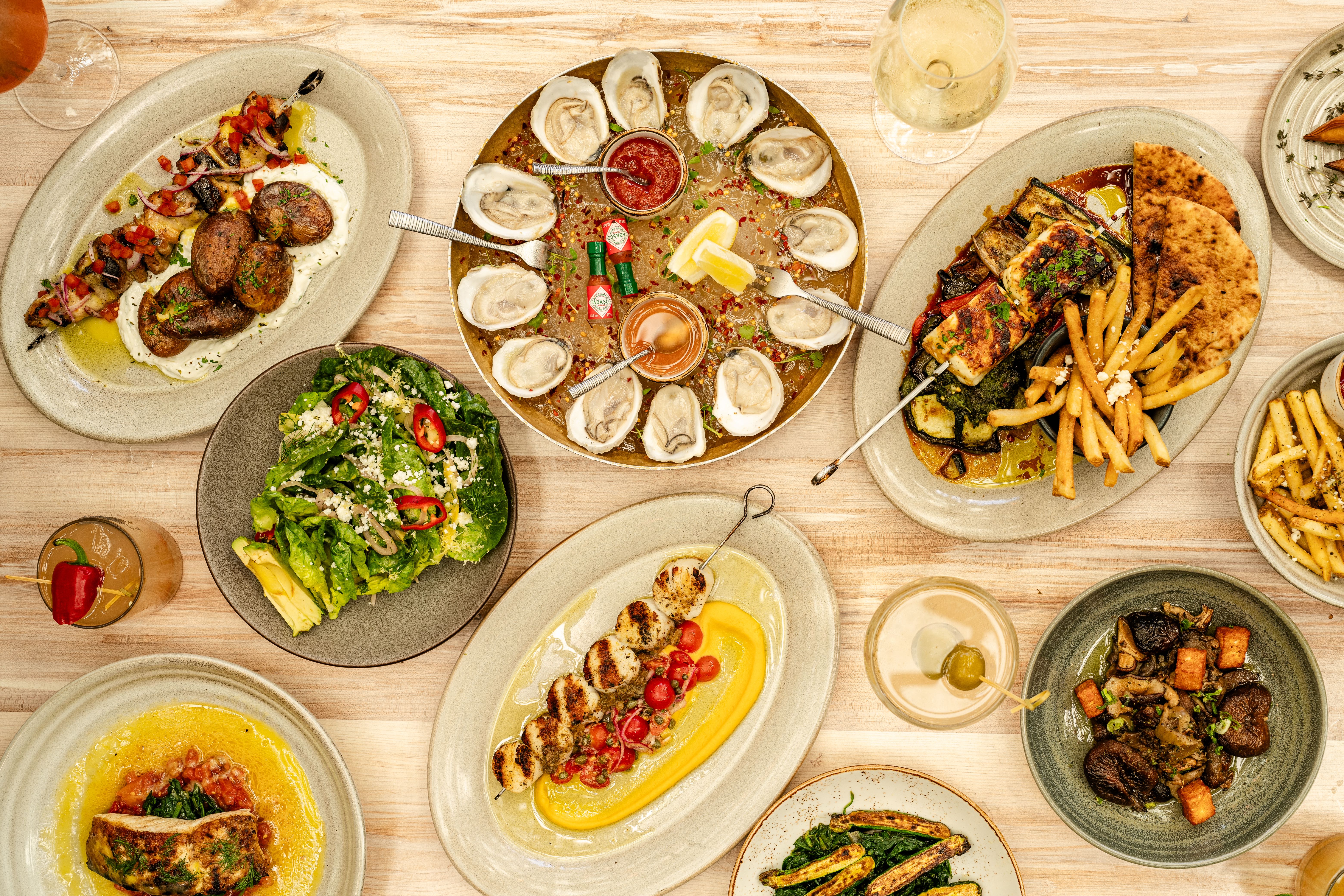 a bunch of different types of food on a table