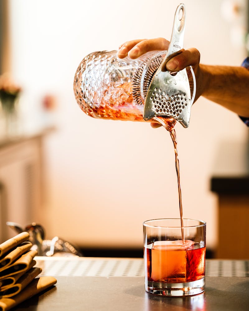 a glass of wine on a table