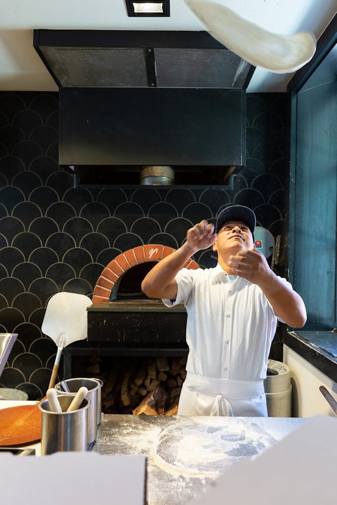 a person cooking in a kitchen