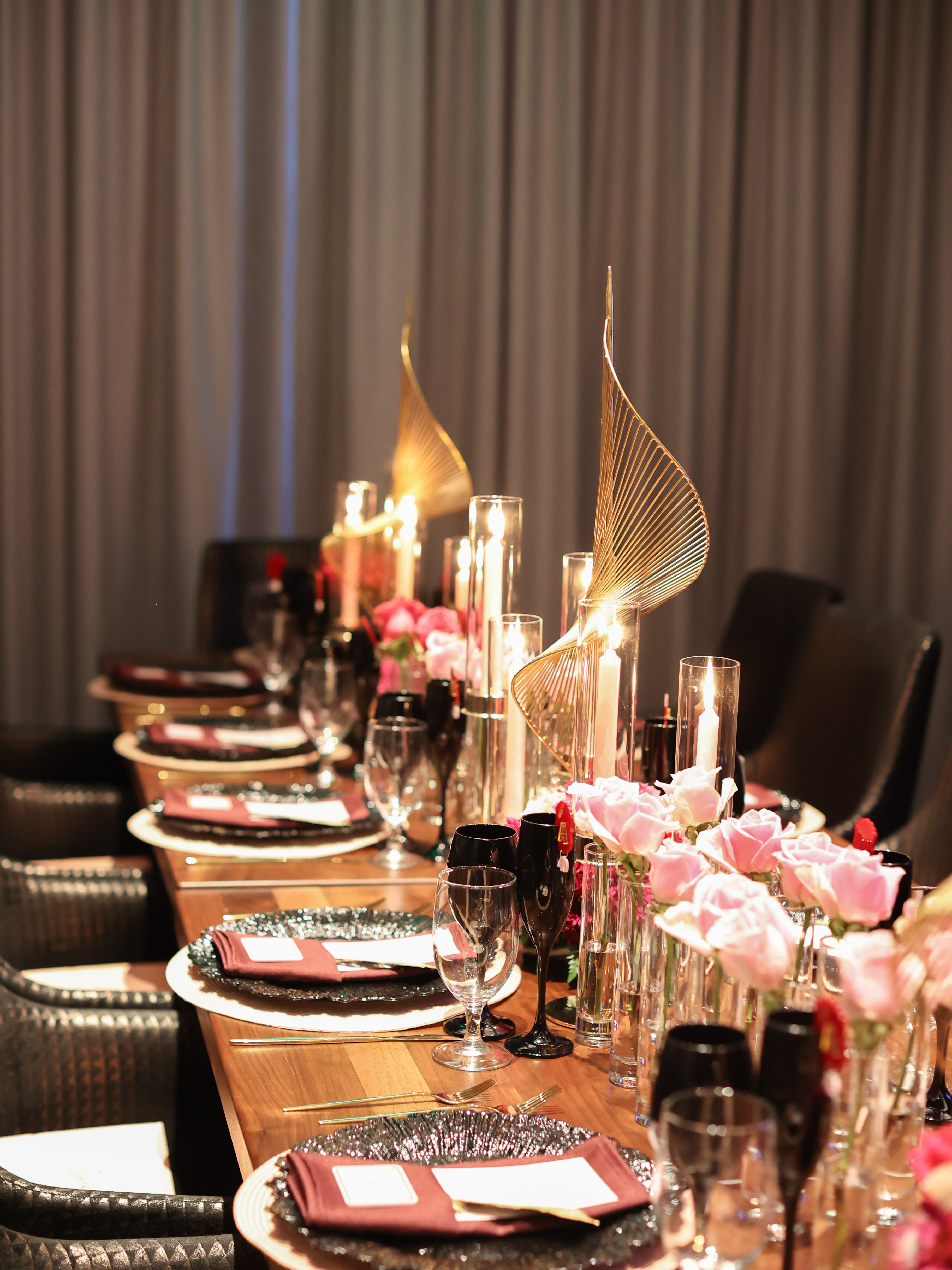 a dining table filled with wine glasses