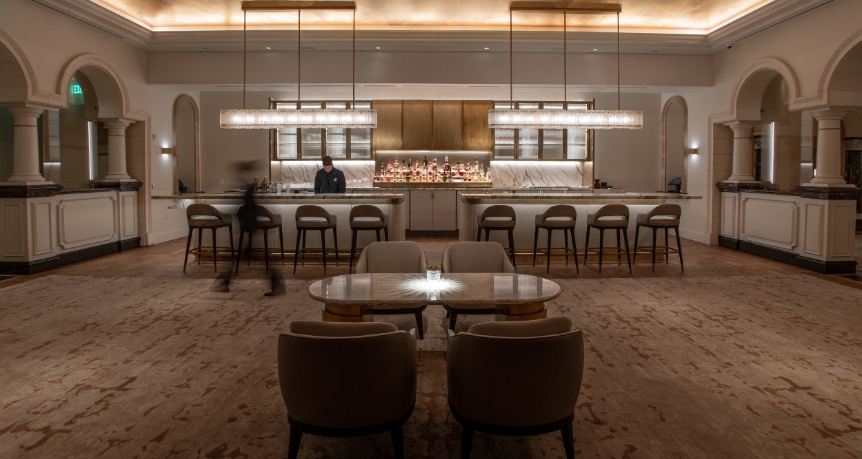 Champagne Lounge -a room with a bar and chairs