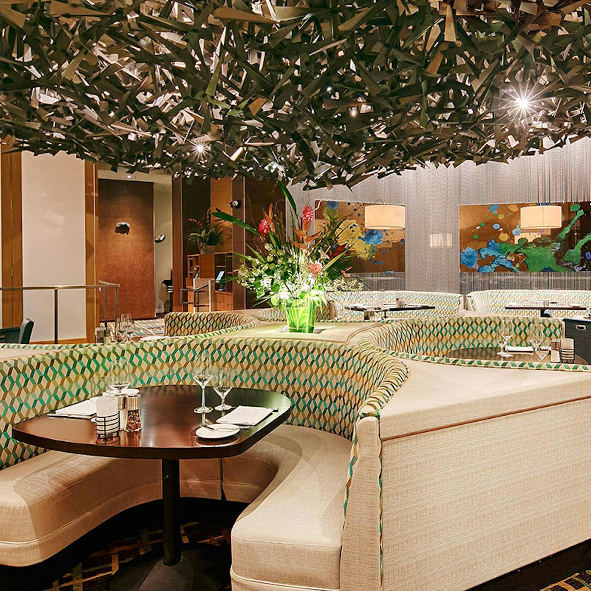 a table topped with lots of green leaves