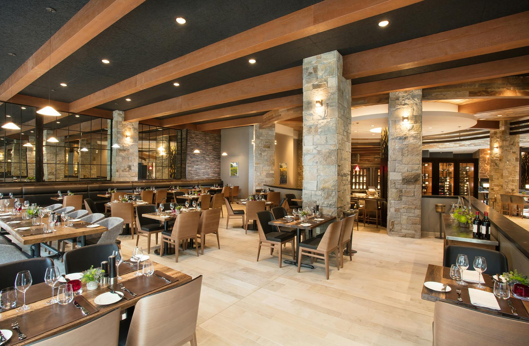 a room filled with furniture and a table in a restaurant