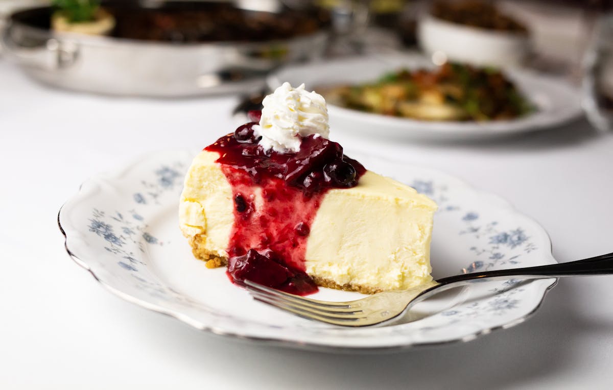 a piece of cake and ice cream on a plate