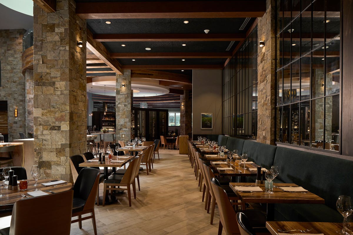 a dining room table in front of a building