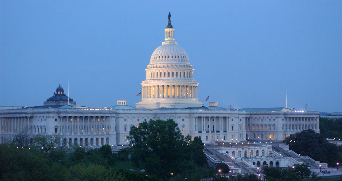 a large building with United States Capitol in the background