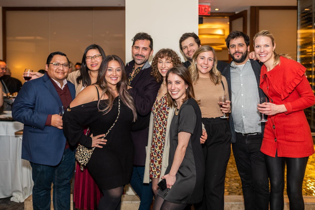 a group of people posing for a photo