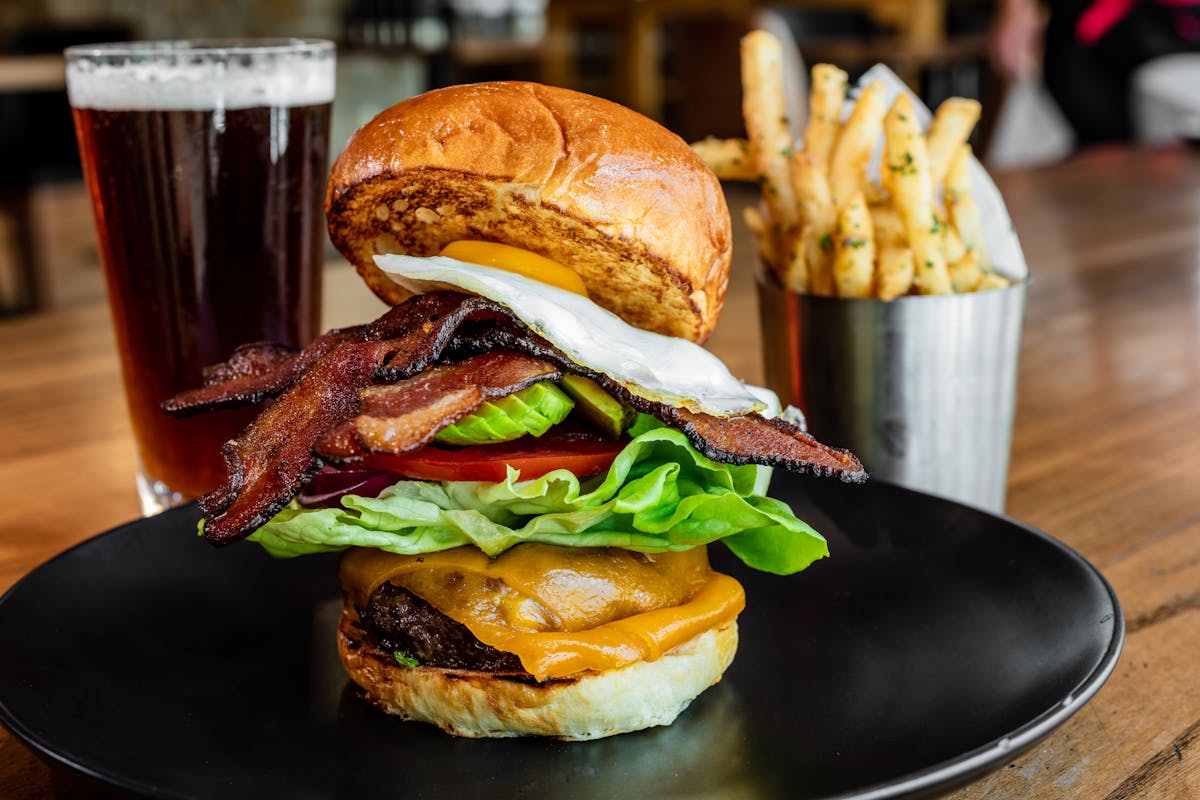 a sandwich sitting on top of a wooden table