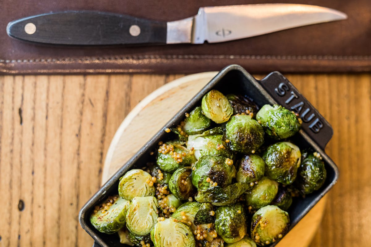 a tray of food on a wooden table