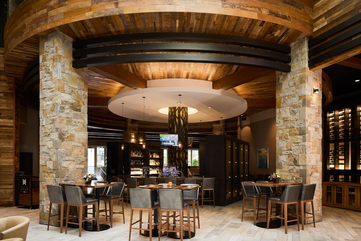 a dining room table in front of a building