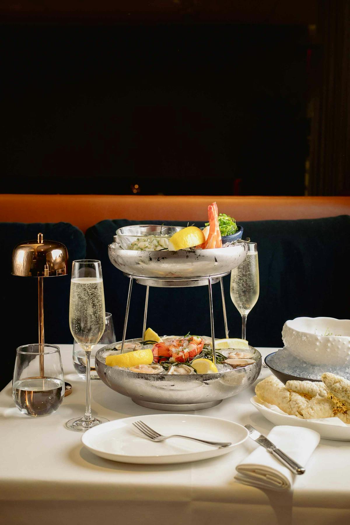 a plate of food and a glass of wine