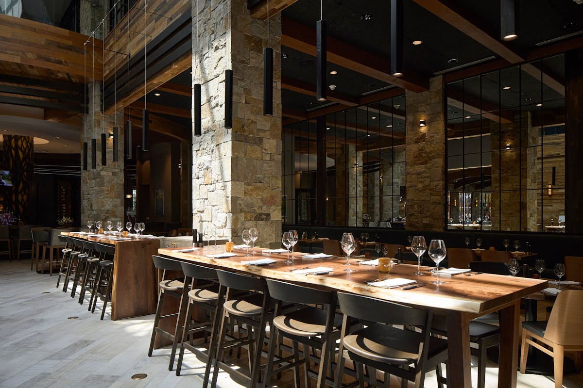 a dining room table in front of a building