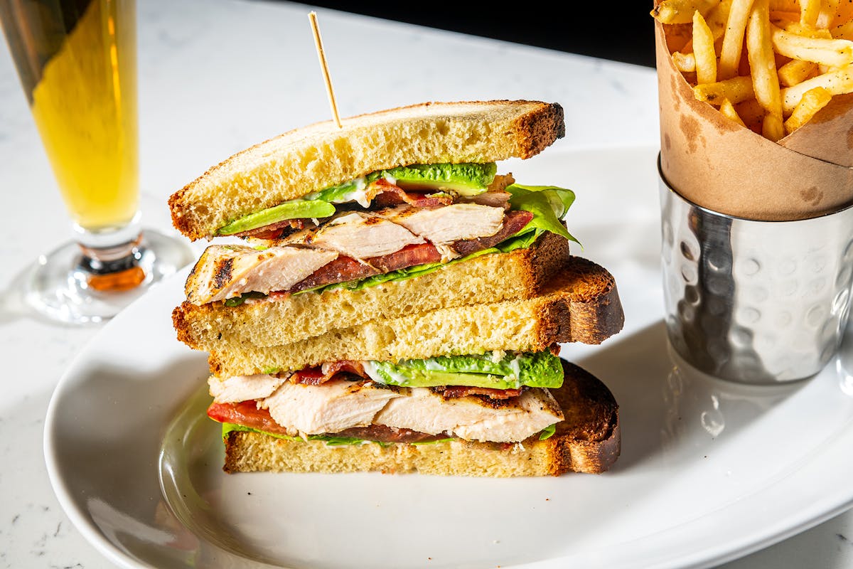 a sandwich cut in half on a plate