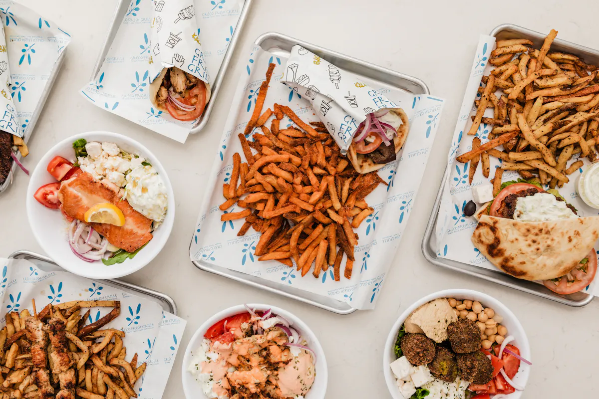 a box filled with different types of food on a plate