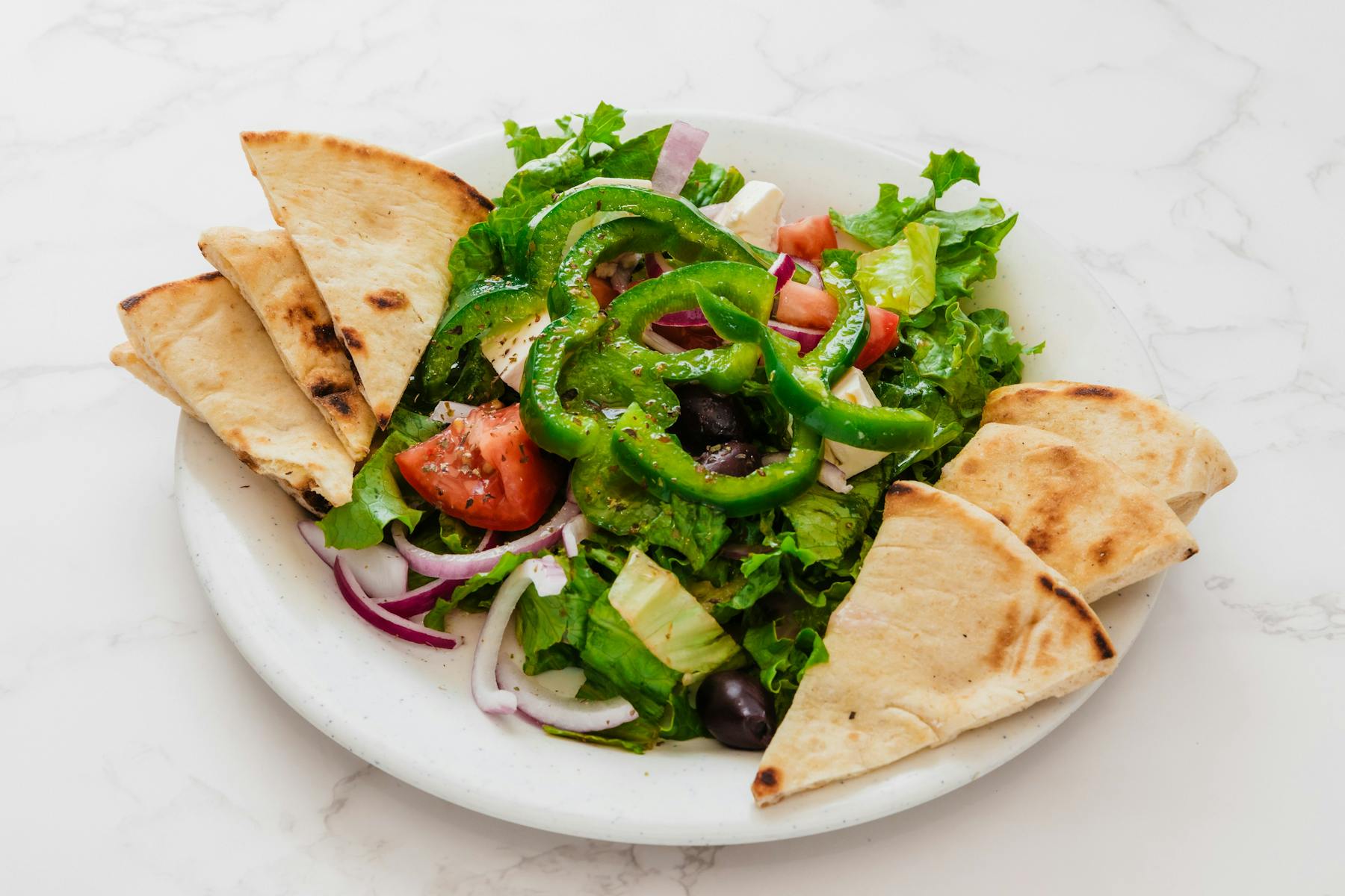 a sandwich and salad on a plate