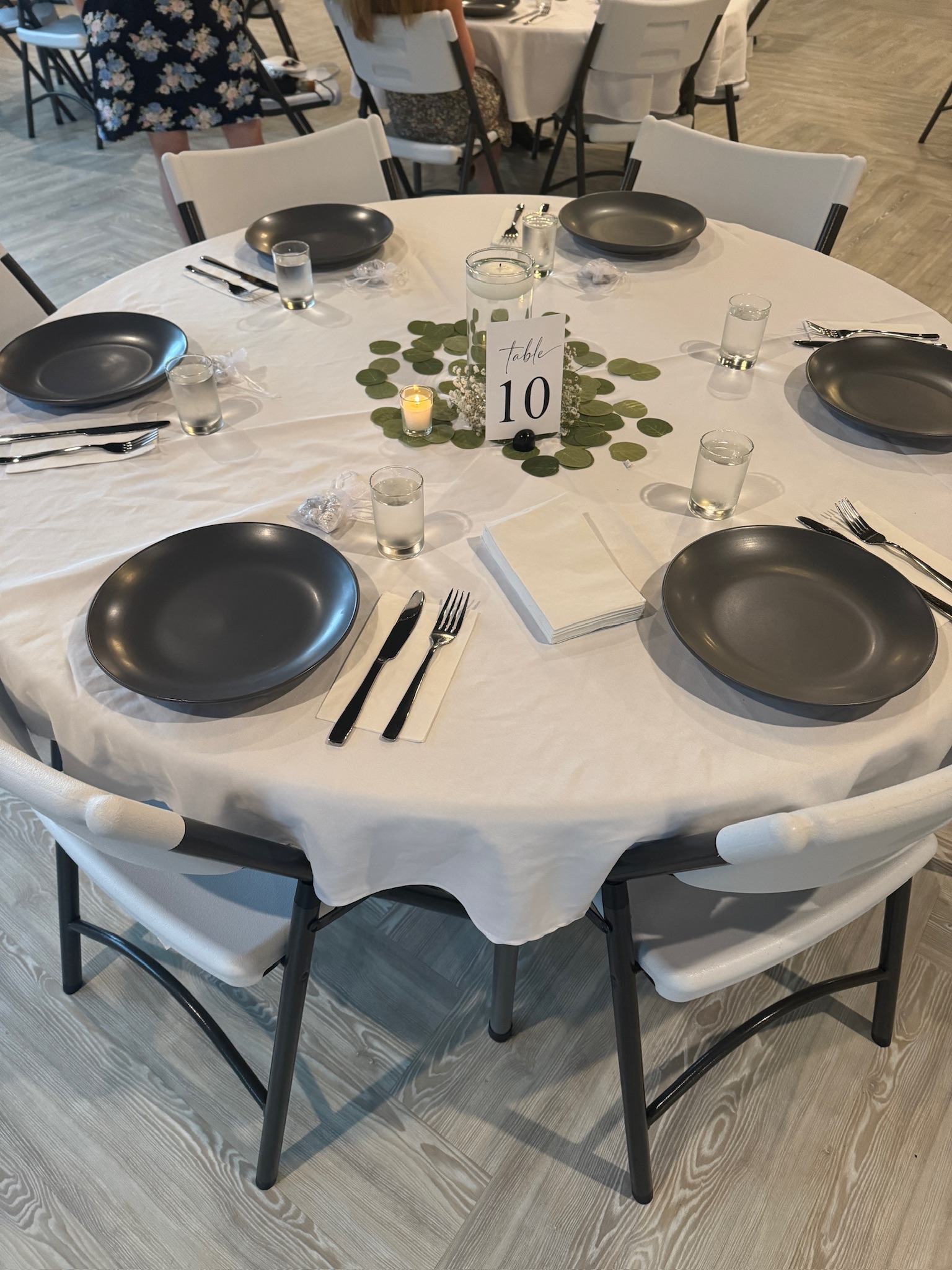 a group of people sitting at a table