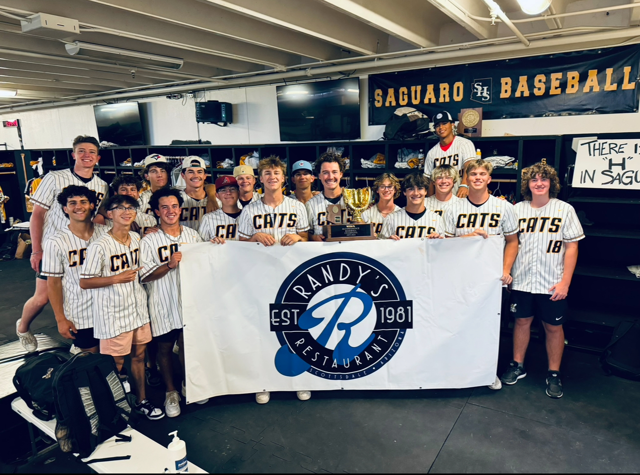 a group of people posing for the camera