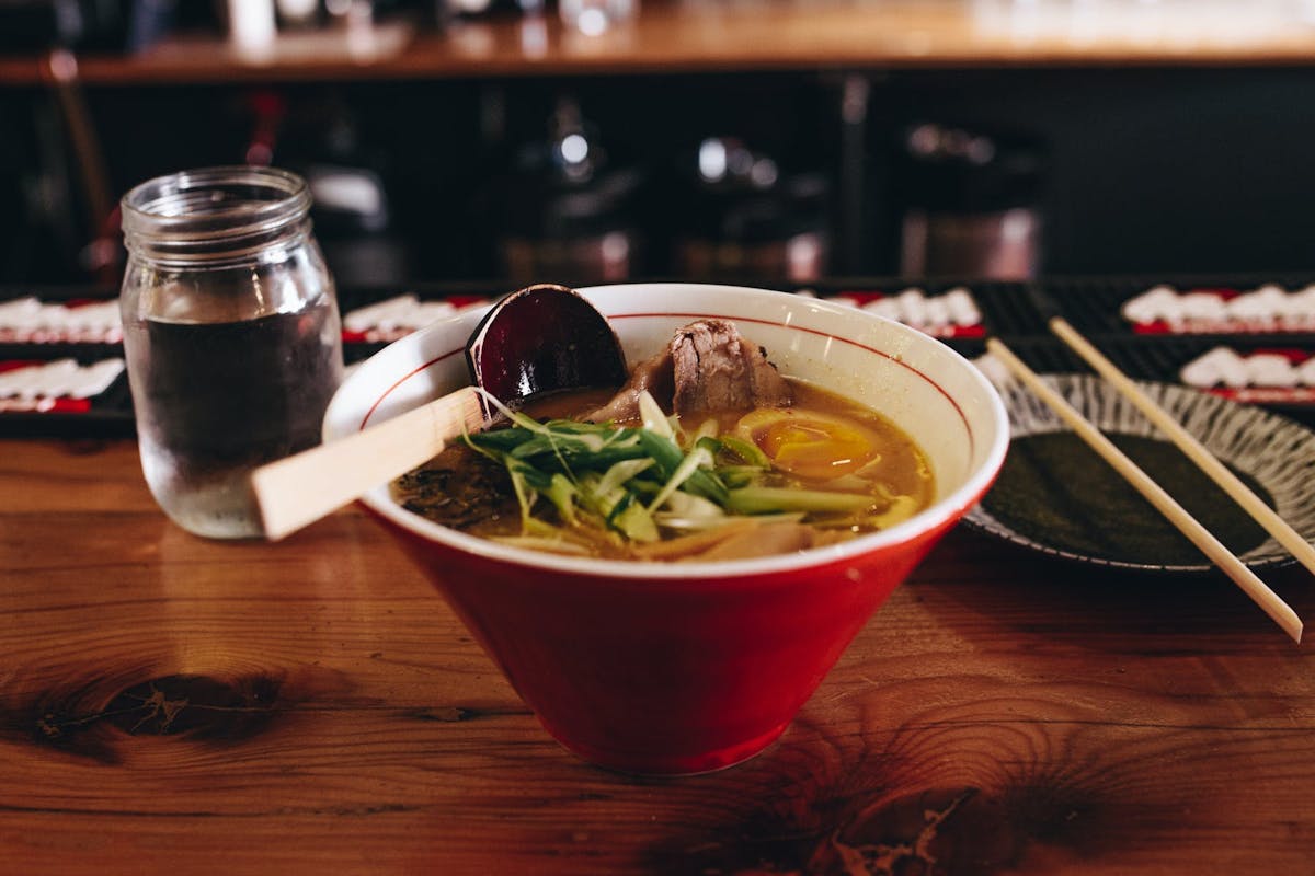 a bowl of food sitting on a table