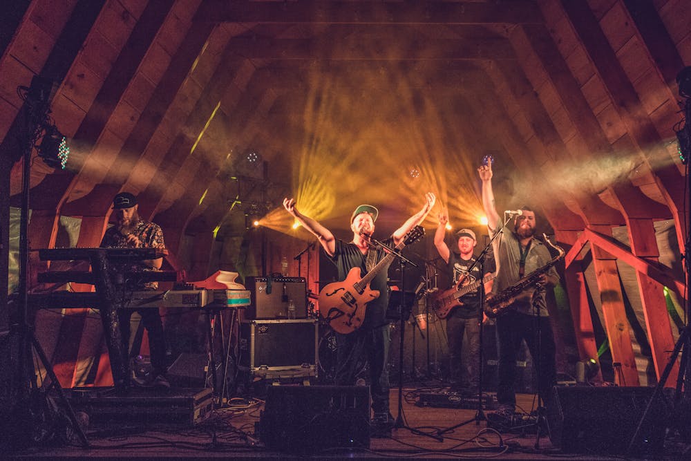 a group of people standing on a stage