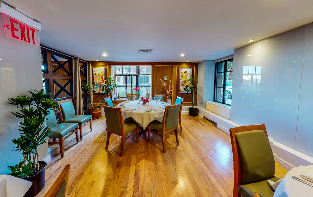 a living room filled with furniture and a flat screen tv