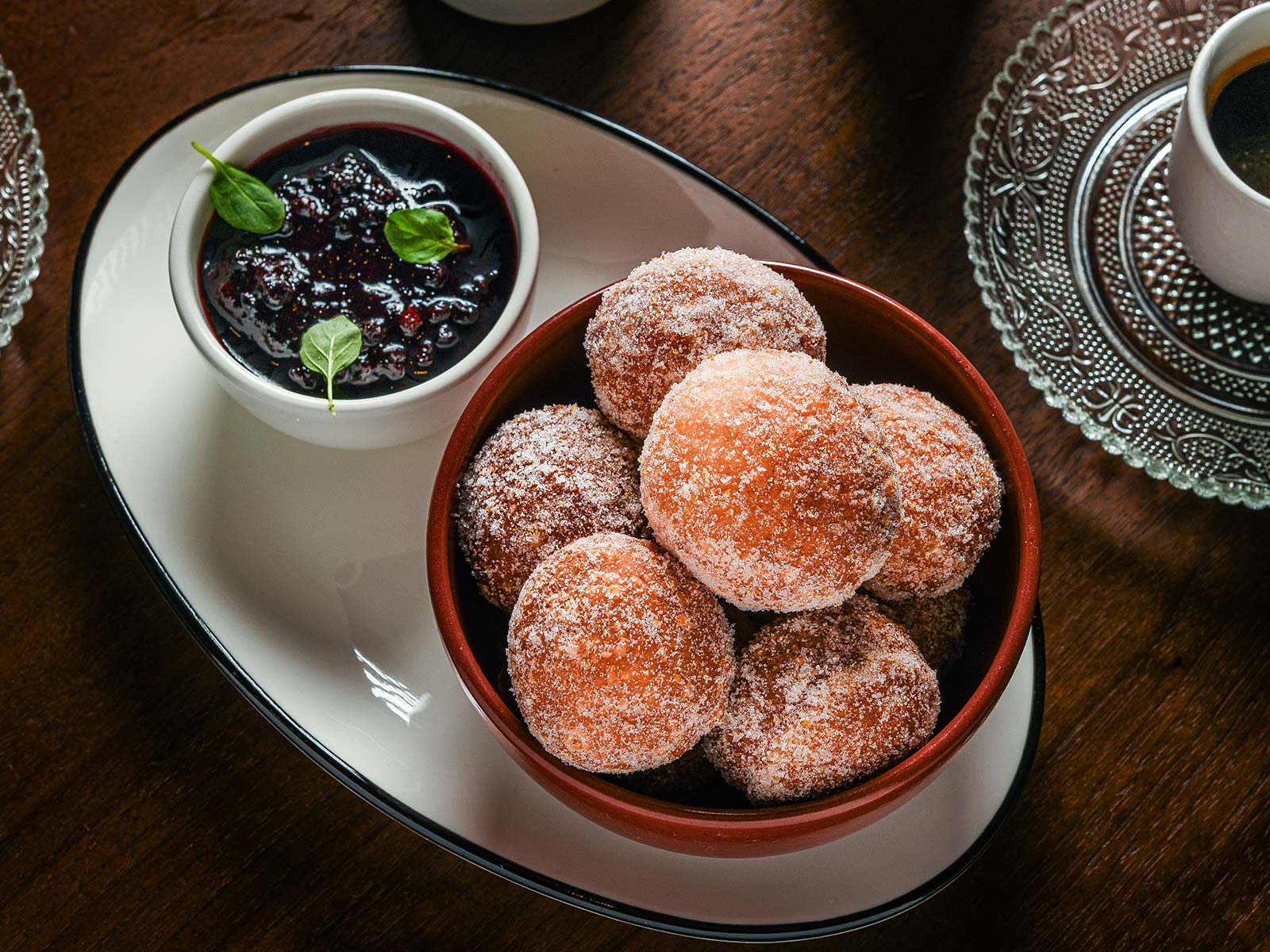 a plate of food and a cup of coffee