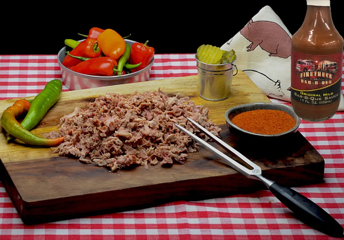 a wooden table topped with plates of food