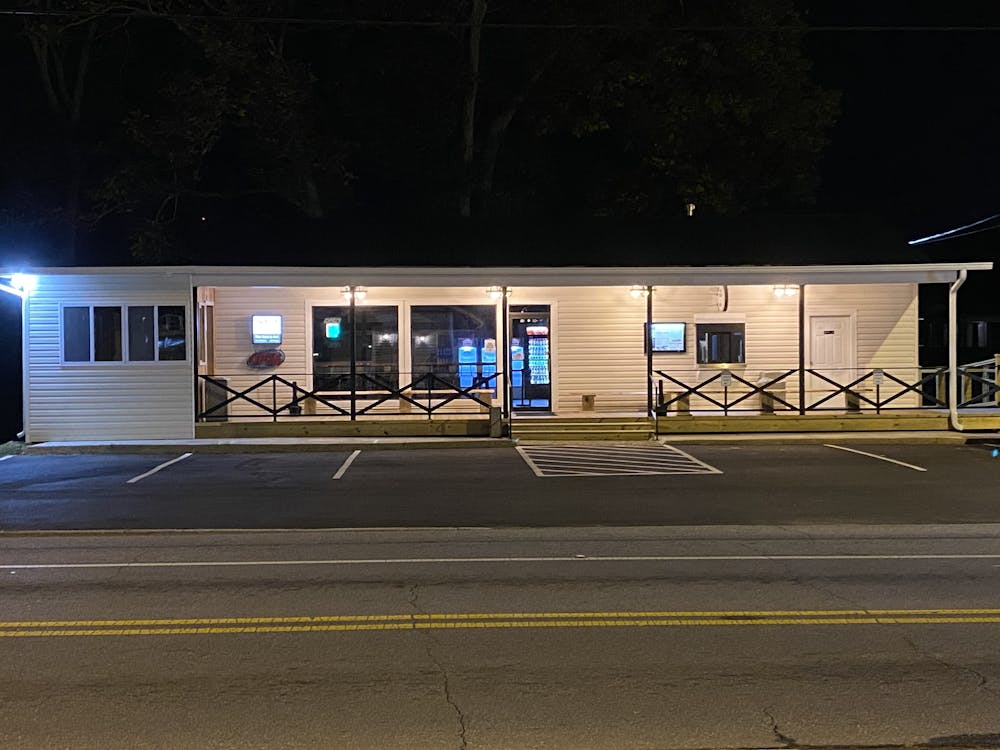 a sign on the side of a road