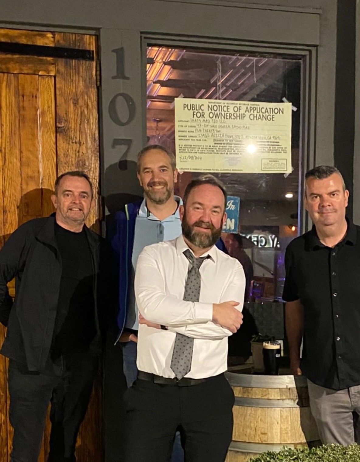 a group of people posing for a photo