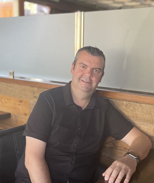 a man sitting on a table
