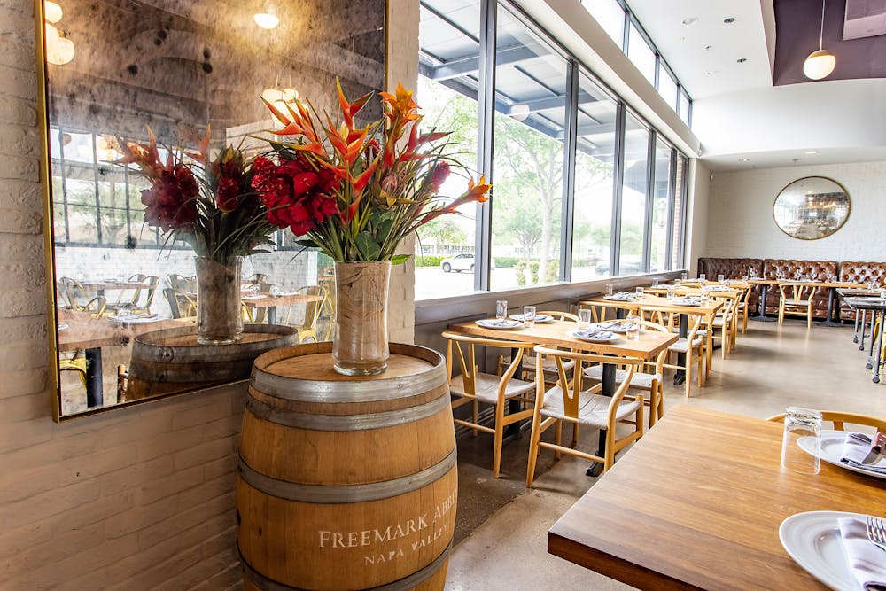 a dining room table in front of a building