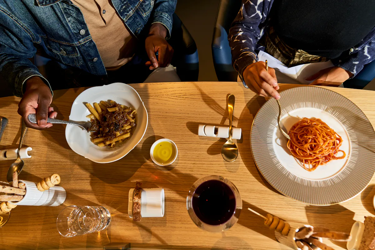 a group of people sitting at a table