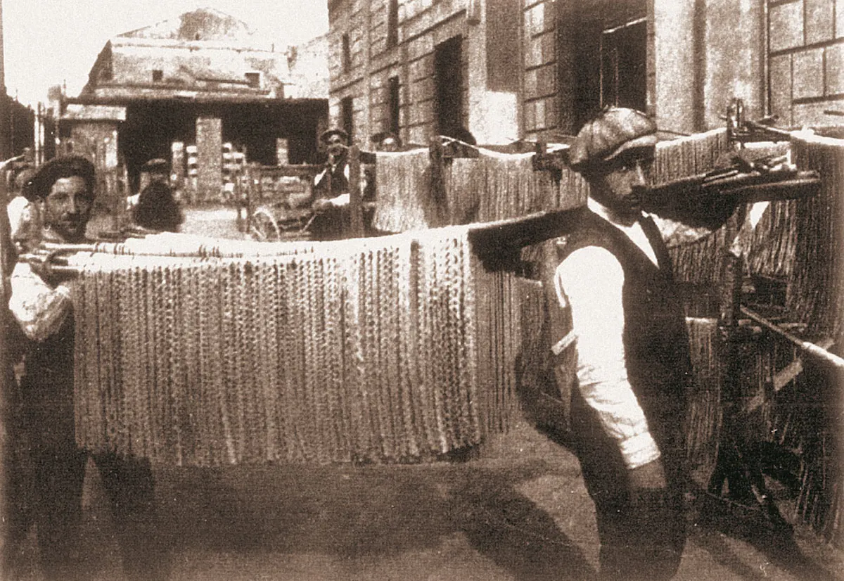 a group of people standing in front of a building