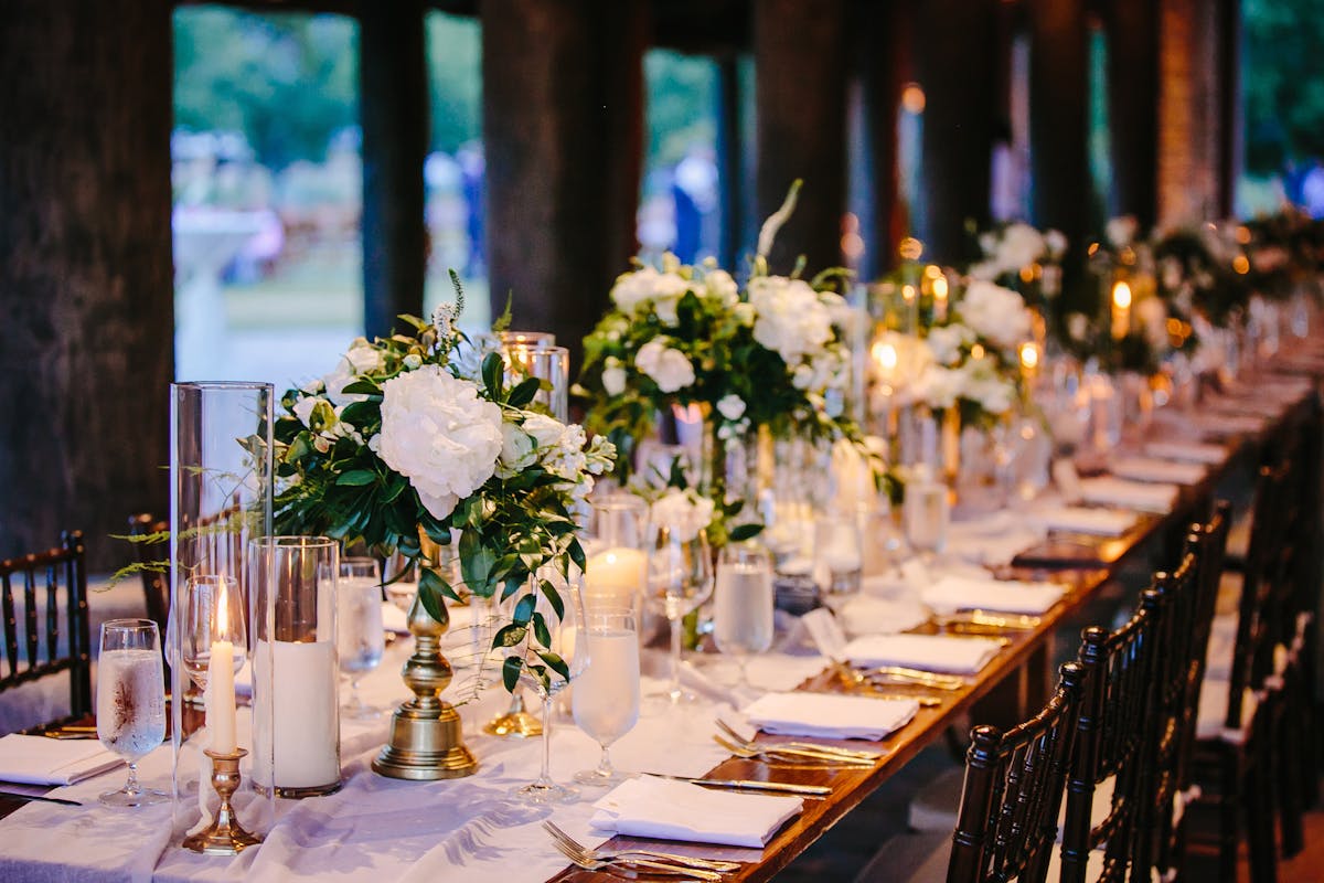 a dining table filled with wine glasses