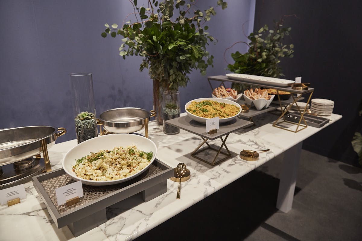 a table topped with plates of food on a plate