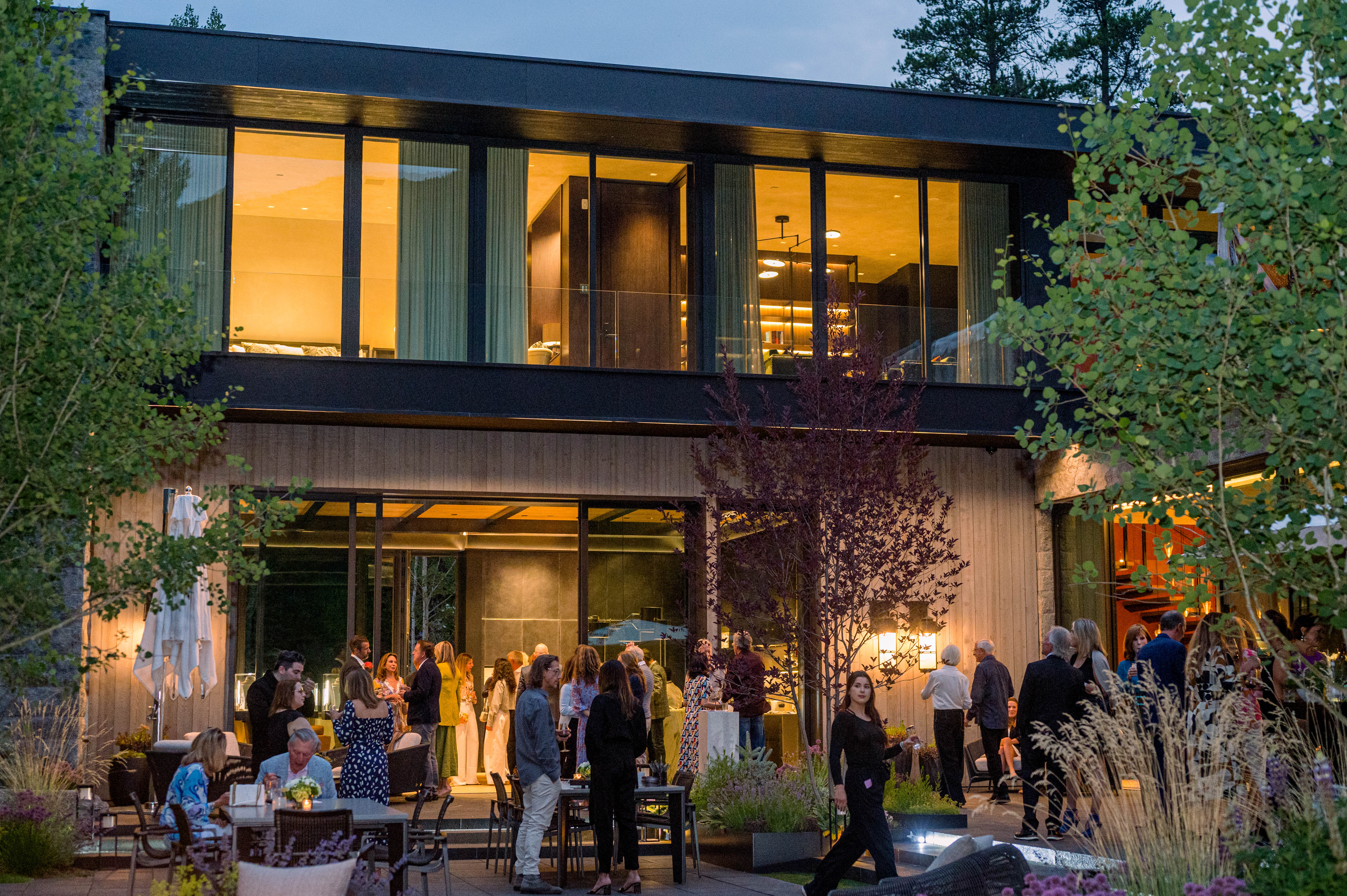 a group of people standing in front of a building