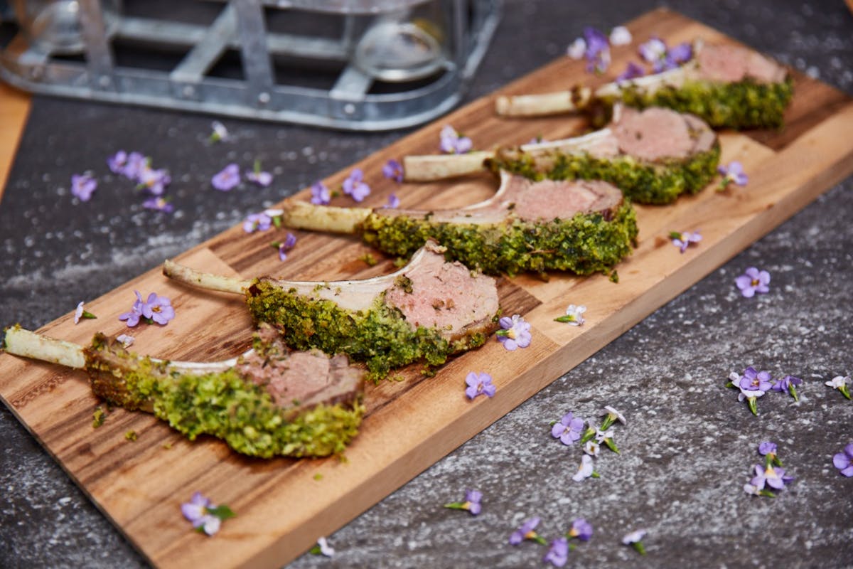 a wooden cutting board with a cake