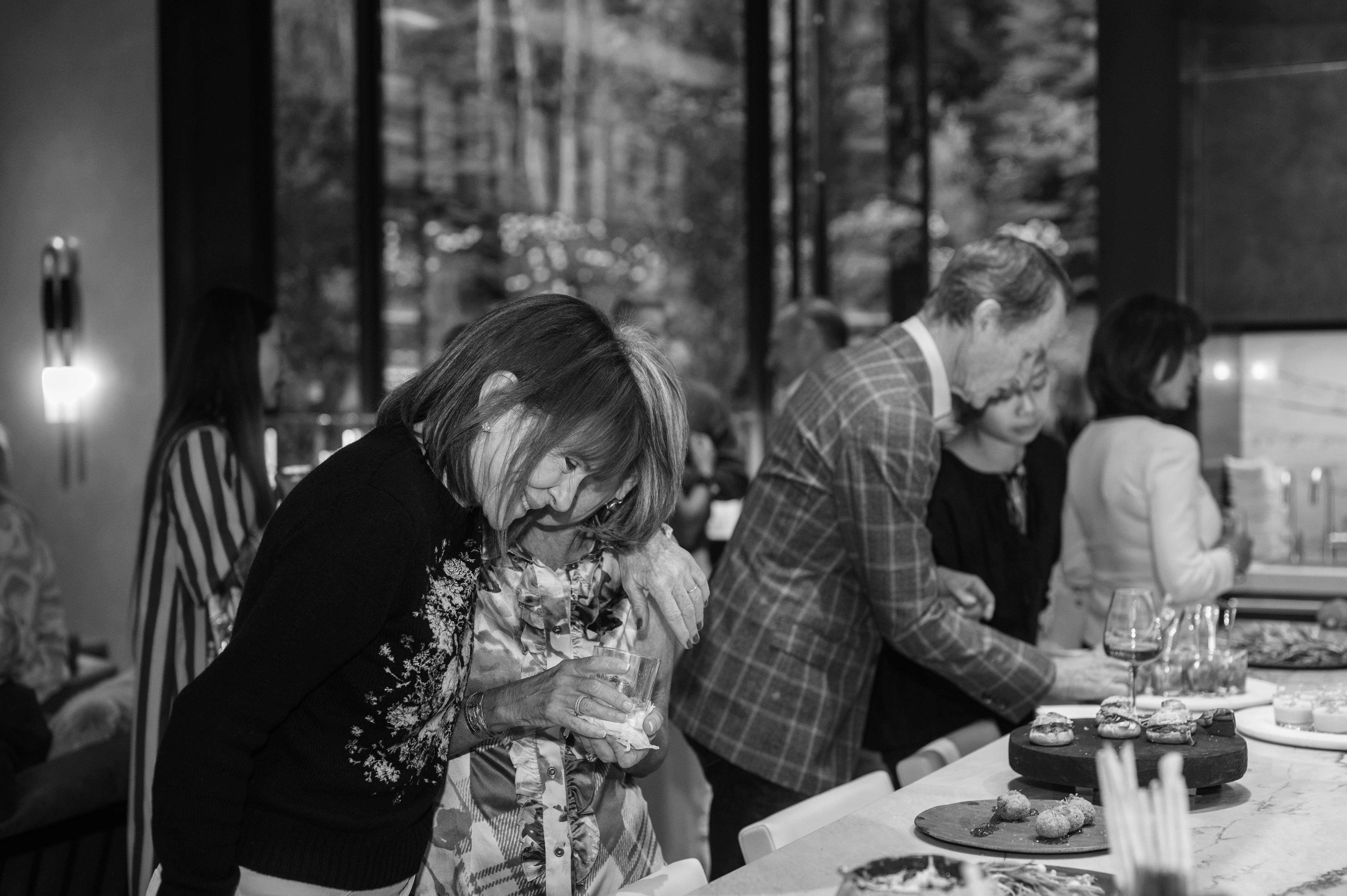 a man and a woman sitting at a table