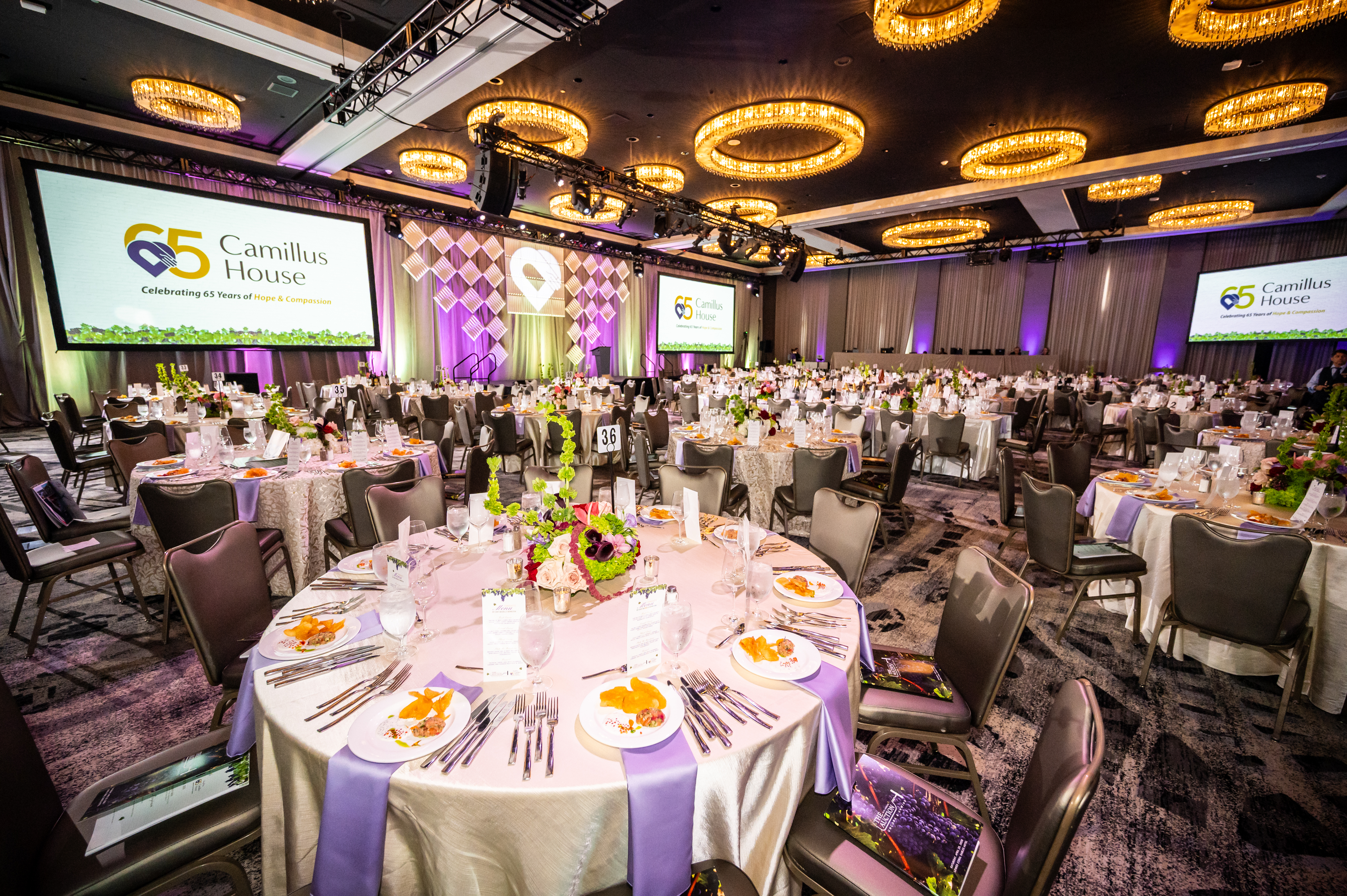 a large room with tables and chairs