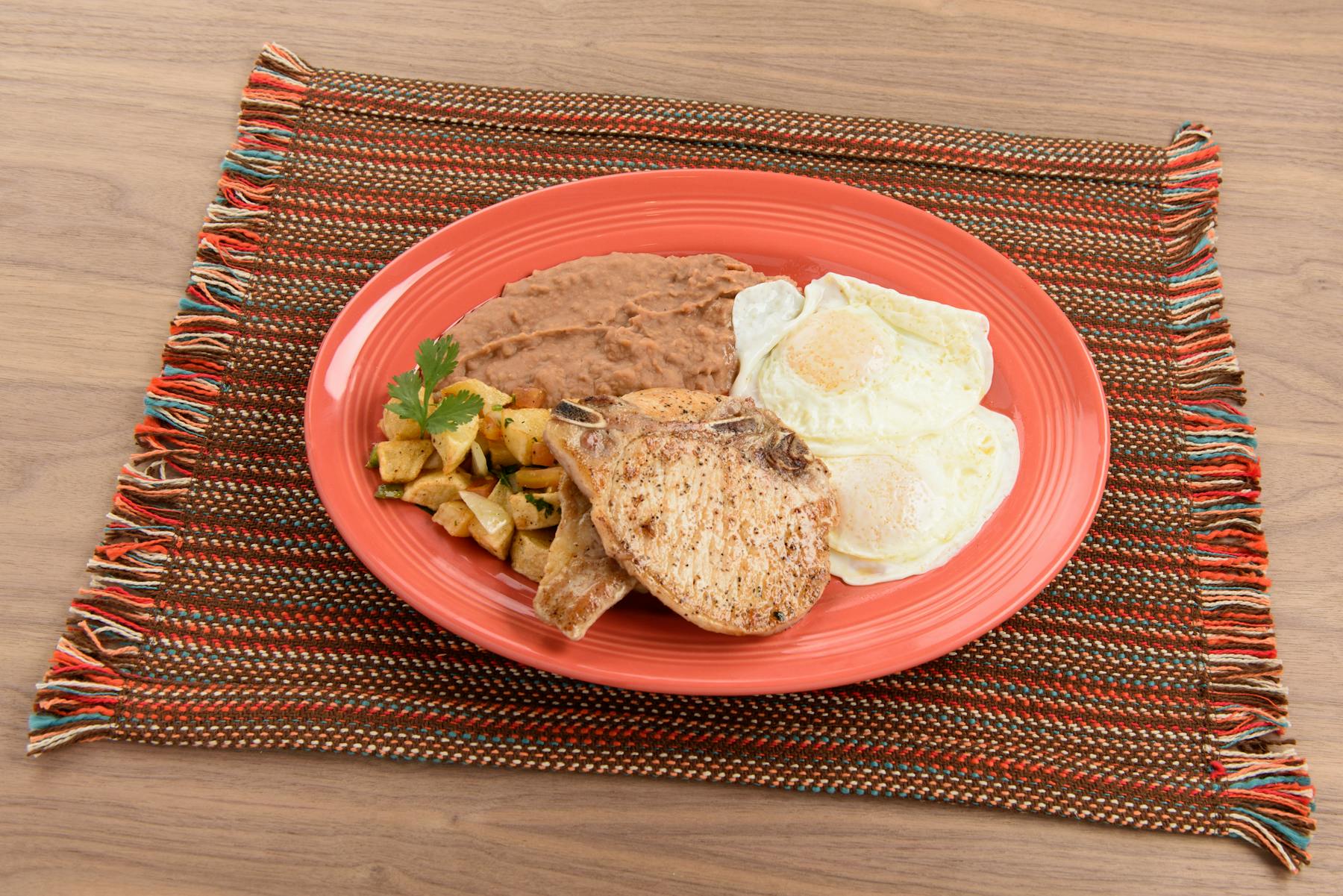a plate of food on a picnic table