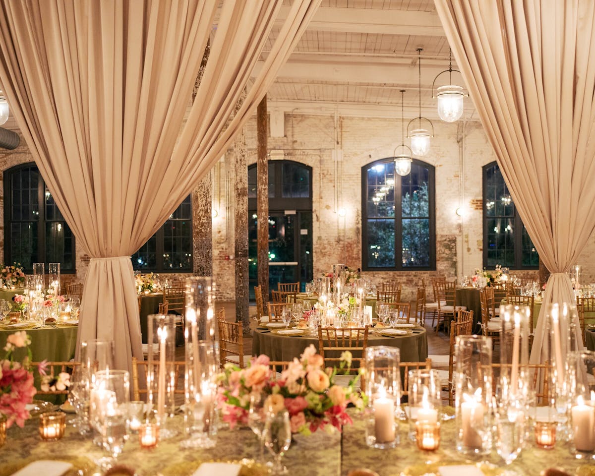 a dining table filled with wine glasses
