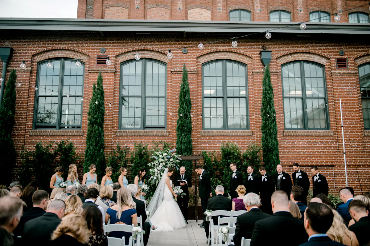 a group of people in front of a building