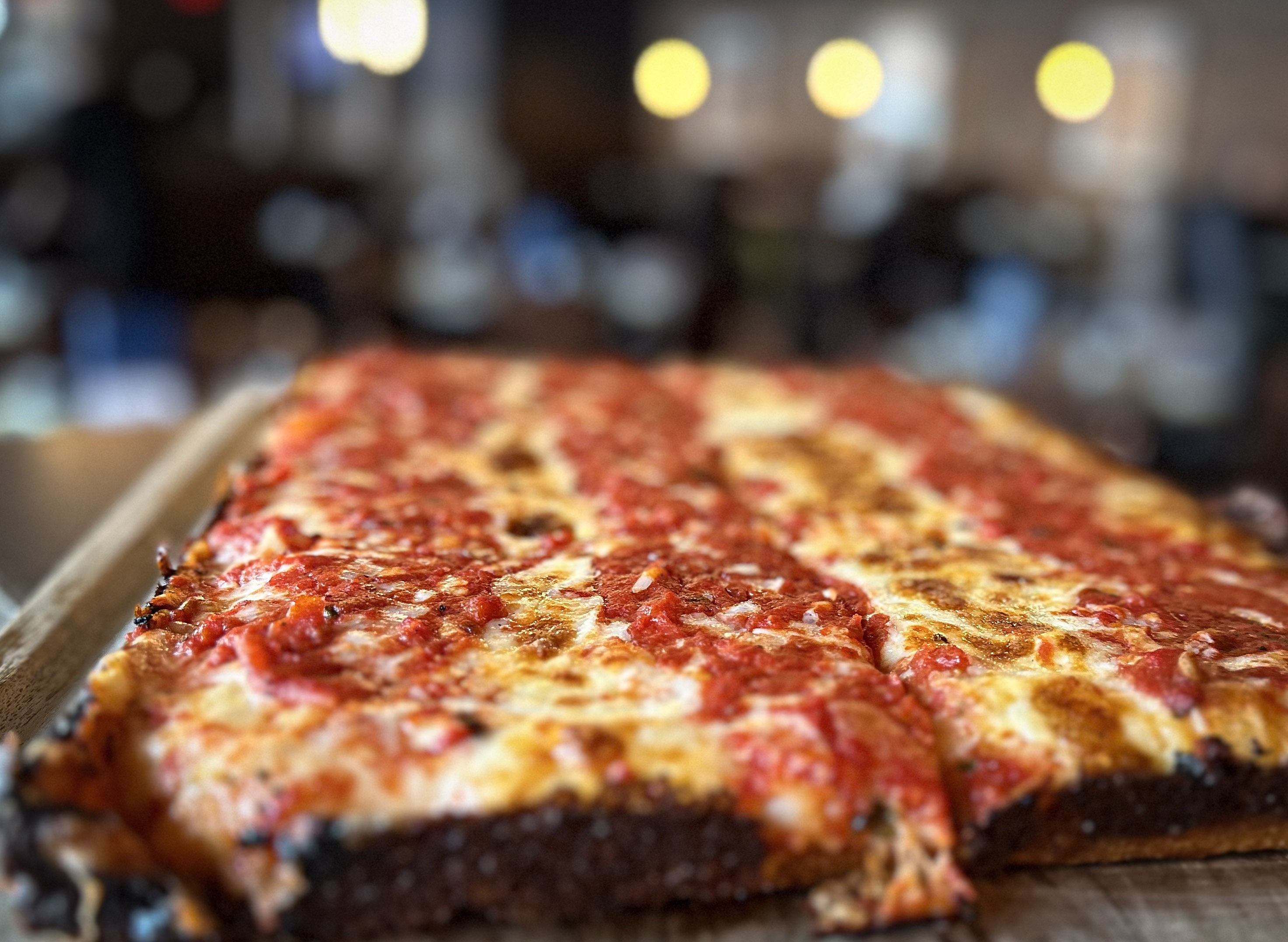 a close up of a slice of pizza